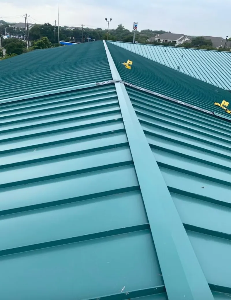 Green commercial metal roof ridge and valley for Metal Roof Repair in D'Iberville