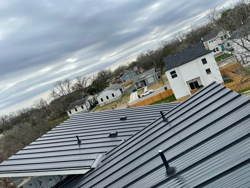 Standing seam metal roof panels with vents for Skylight Repair in D'Iberville